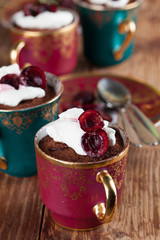 Raw vegan avocado chocolate mousse with cherries