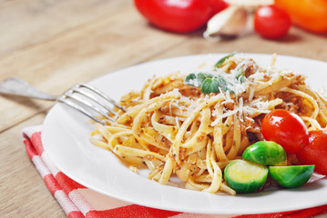 Pasta bolognese on the wooden table