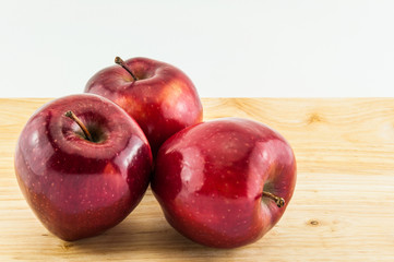 Apple on wooden background
