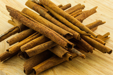 cinnamon rolls on wood background