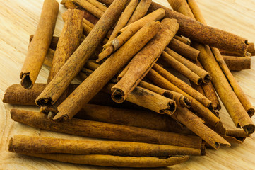 cinnamon rolls on wood background