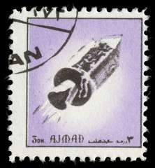 Obraz premium Stamp printed in emirate Ajman show spaceship, circa 1972