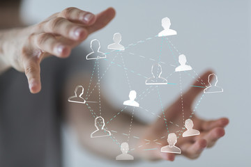 profil -  Businessman holding 3D rendering group of blue people 