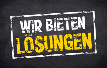 Kreidetafel mit Stempel Wir bieten Lösungen