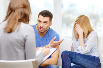 young couple with a problem at psychologist office