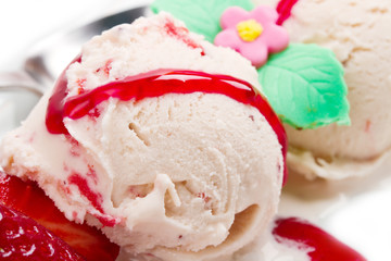 Strawberry ice cream with fruits close up