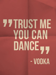 "Trust me you can dance" quote on folded paper background