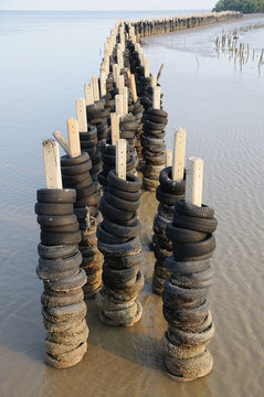 Wave barrier made from many old tires, Protection