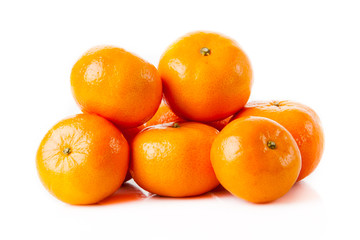 ripe juicy tangerine on a white background.  Clementine Mandarin