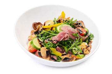 Warm salad with a cutting of a lamb