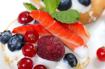 Profiteroles with berries currant