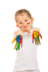 Girl showing messy colorful hands