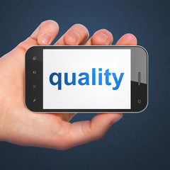 Marketing concept: Quality on smartphone