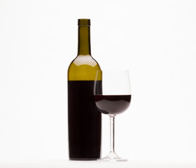 Red wine and wine glass isolated on white