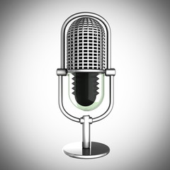 Retro microphone on gray background