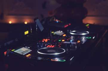 Disc Jockey mixing deck and turntables