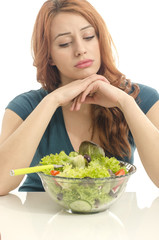 Happy woman eating organic salad. Woman keeping a diet 