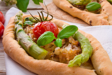 home-baked pide with green asparagi