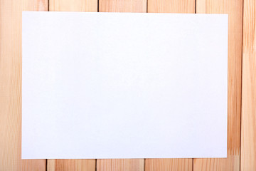 Paper on wooden background