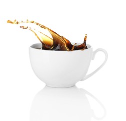 Cup of coffee with splash, isolated on white