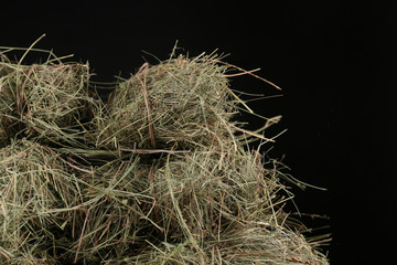 Hay, on dark background