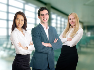 Three business professionals crossing arms posture