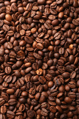 Coffee beans on table close-up