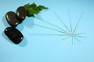Composition with needles for acupuncture, close up.