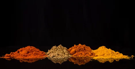  Mix powdered spices background © akulamatiau