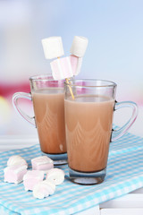 Hot chocolate with marshmallows, on light background