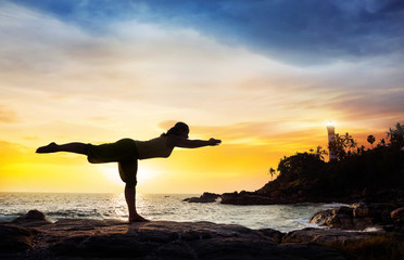 Yoga near lighthouse