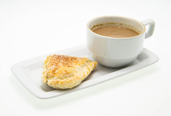 Breakfast with coffee and puff pastry