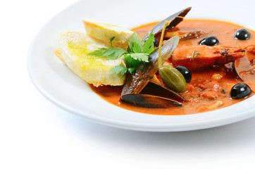 Tomato soup with fish and seafood