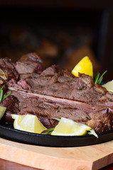 Stake from mutton with a lemon