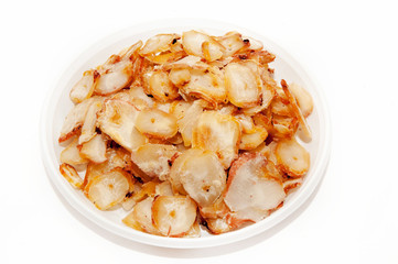 Dried fishes on a plate 