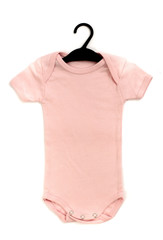 Close up of a pink baby bodysuit on a hanger