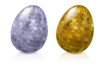 Set of glossy metallic faceted easter eggs - golden and silver.