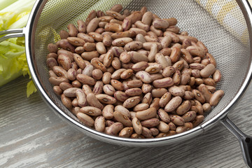 Borlotti beans in a sieve