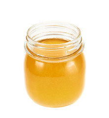 Opened honey jar isolated
