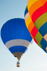 hot air balloons over blue sky