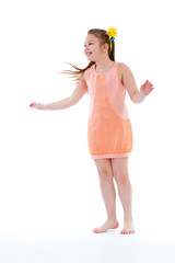 Young girl jumping on vacation.