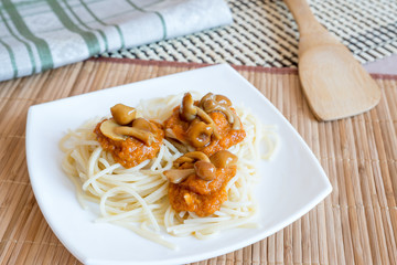 Pasta with mushrooms and sauce