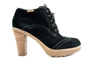 Women's boots with black suede on a white background