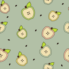 Apple halves with leaves seamless background