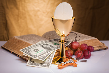 holy communion and dollar money