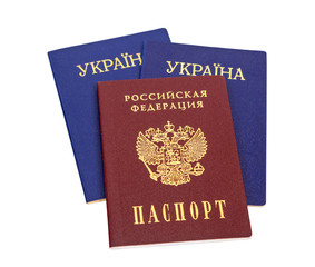 Ukrainian and Russian passports isolated on white background