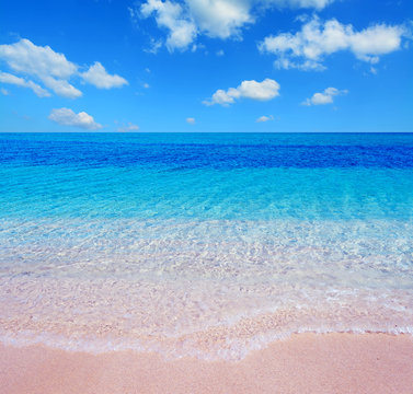 Pink Beach And Clouds