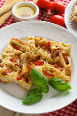 Focaccia with tomatoes and oregano