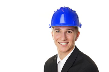 Portrait of young man with protective helmet close up