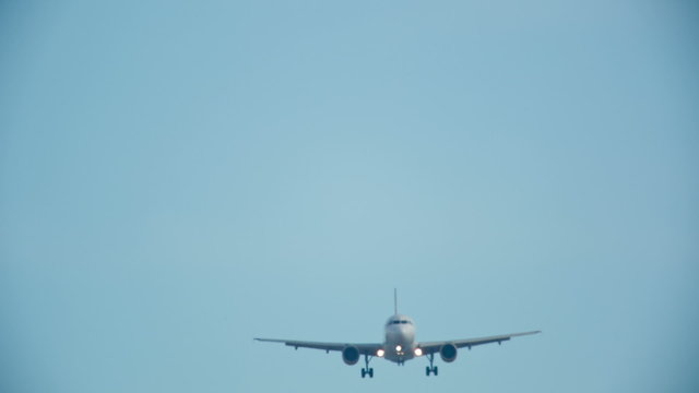 an airplane landing at barcelona airport 